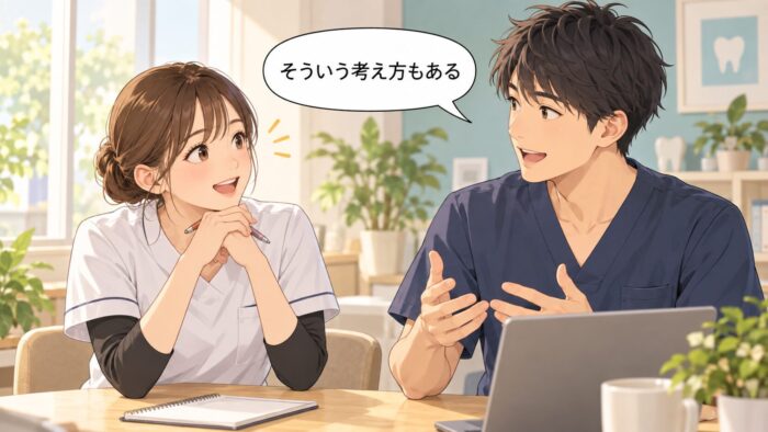 違うやり方の説明にうなずいて耳を傾ける歯科医院のスタッフ二人