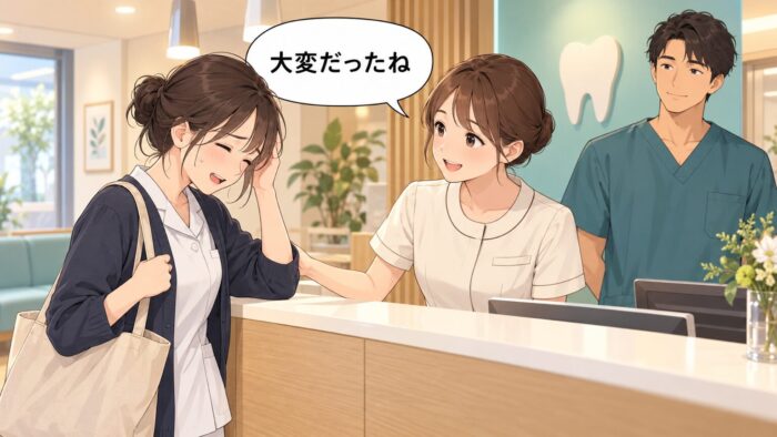 遅れて到着した同僚に、やさしく声をかける受付スタッフ